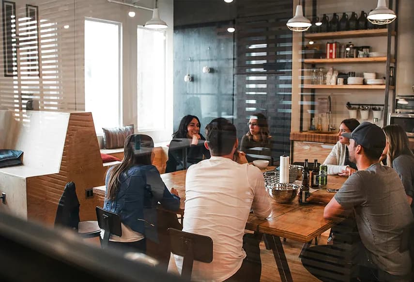 Team of employees learning together in modern office